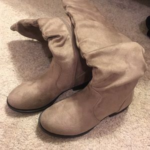 Tan suede boots.